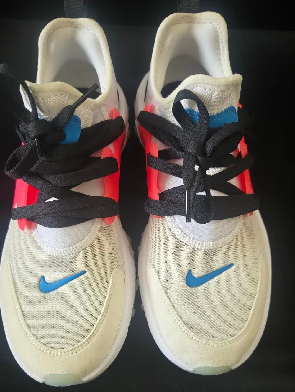 Nike White Athletic Shoes with Coral and Blue Accents